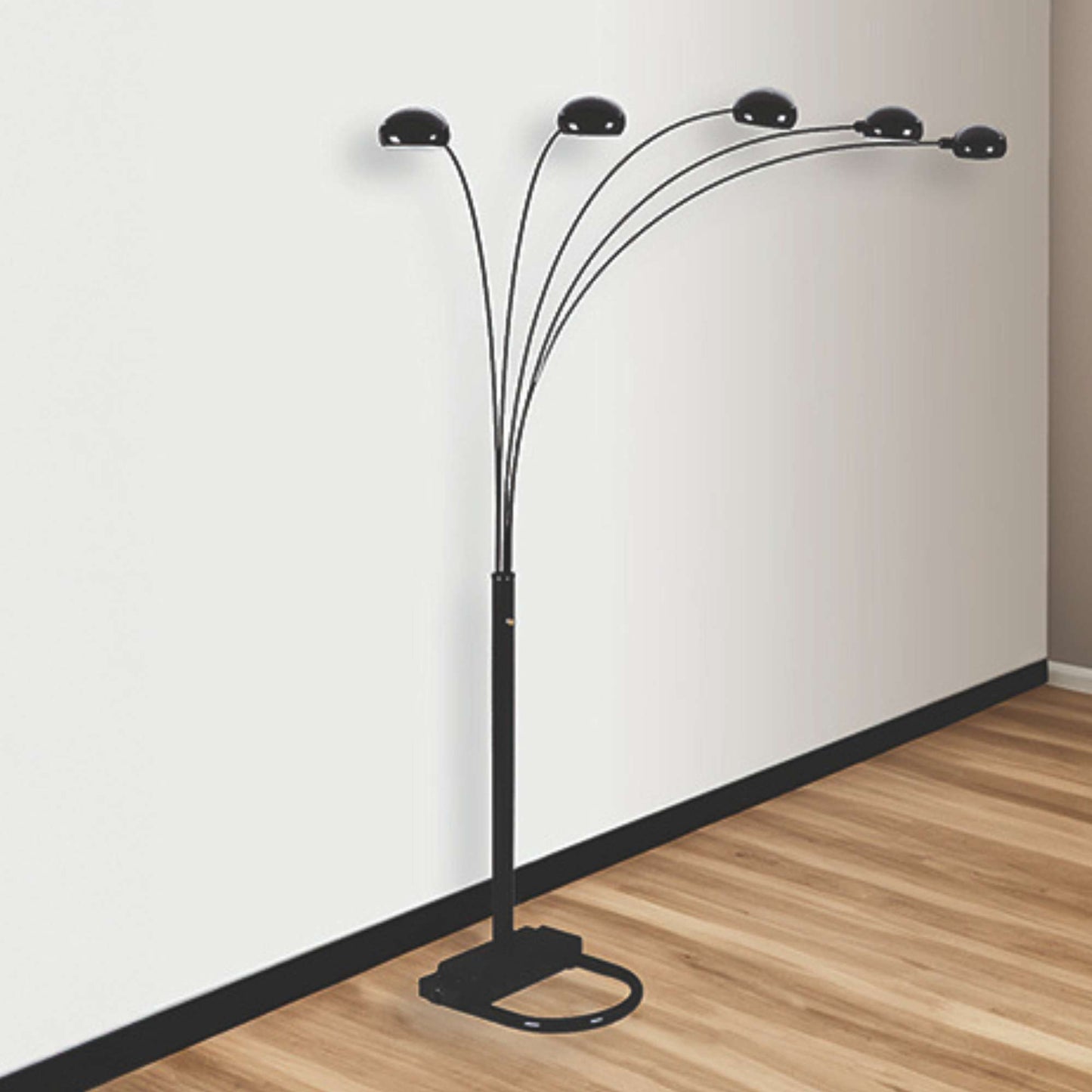 A black peacock floor lamp with a five-light branch structure, standing in an interior setting.