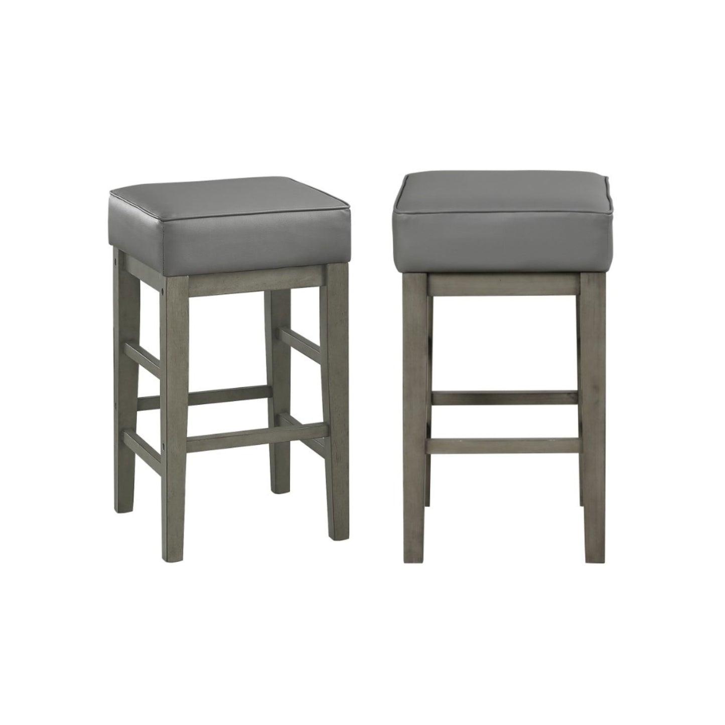 two gray backless square barstools on white background