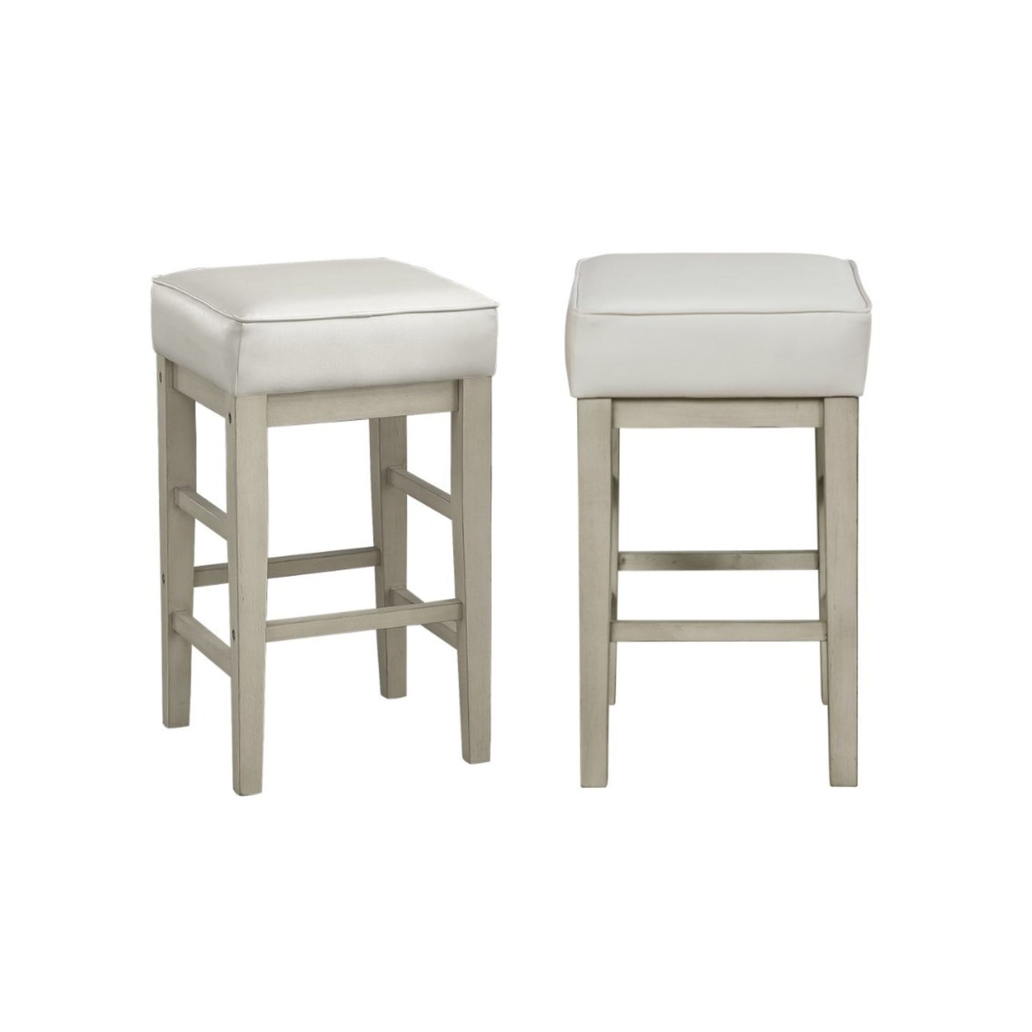 A pair of white counter height stools with a faux leather seat and wooden beige white frame.