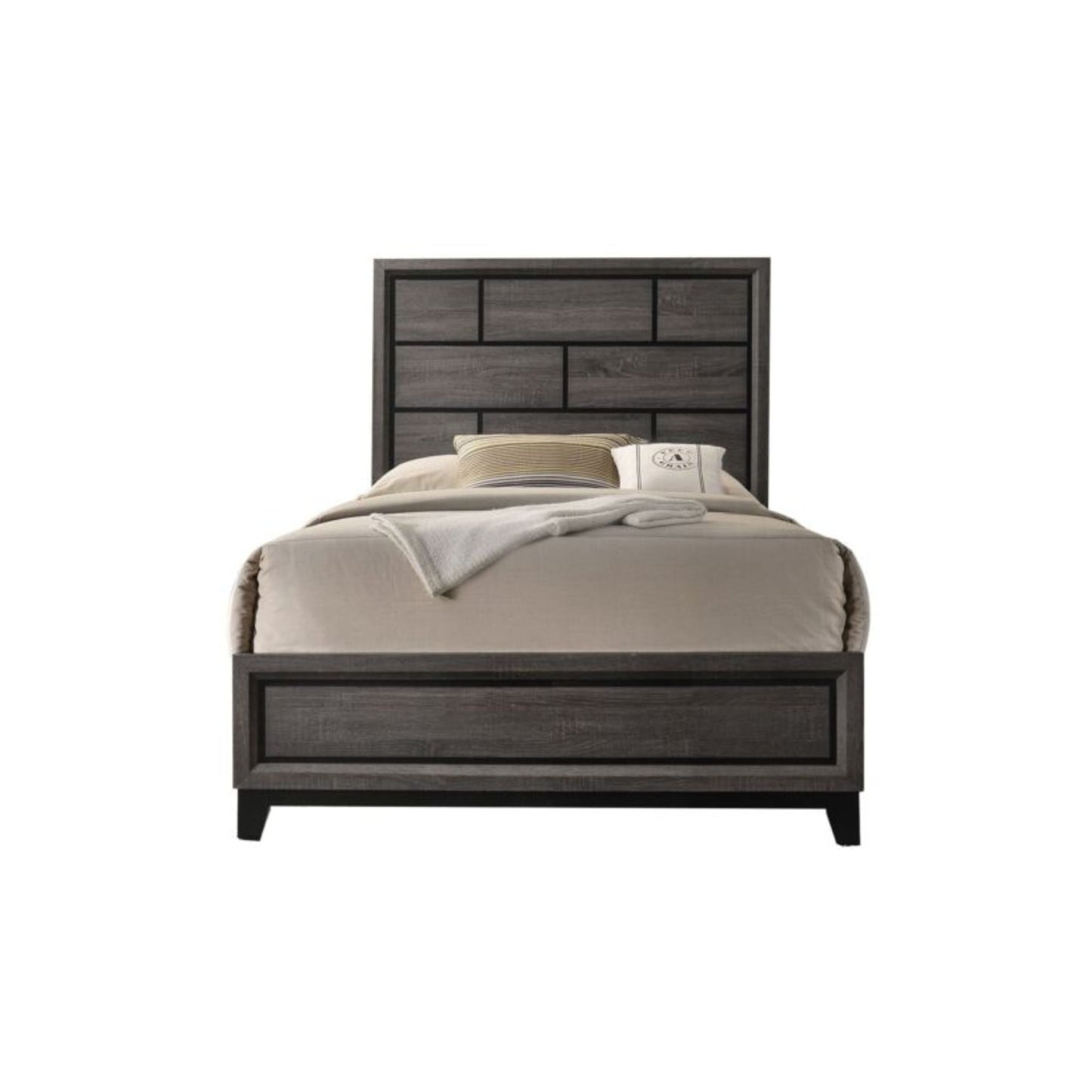 twin bedframe in gray veneer finish and twin mattress with comforter with accent pillow on white background