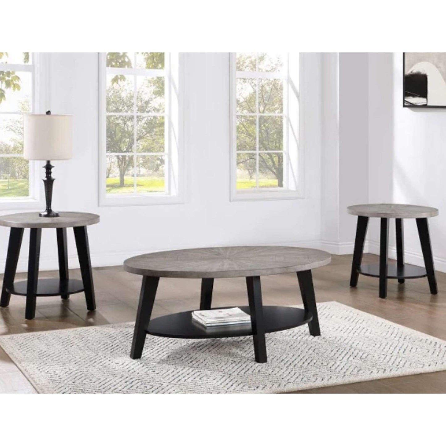 Eldridge coffee table and two end table set with brown gray top and black base with shelf in living room setting