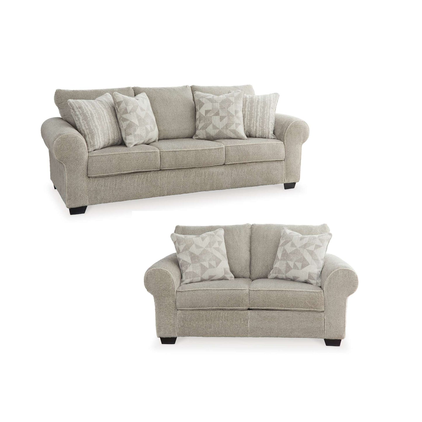 Elisende sofa and loveseat in sisel upholstery with patterned accent pillows on white background
