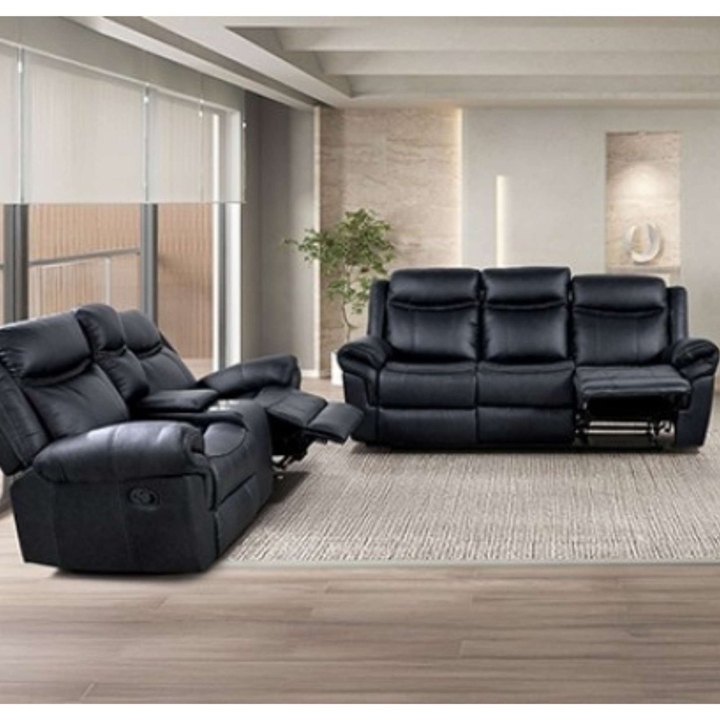Hondo black faux leather dual reclining sofa and console loveseat in living room setting