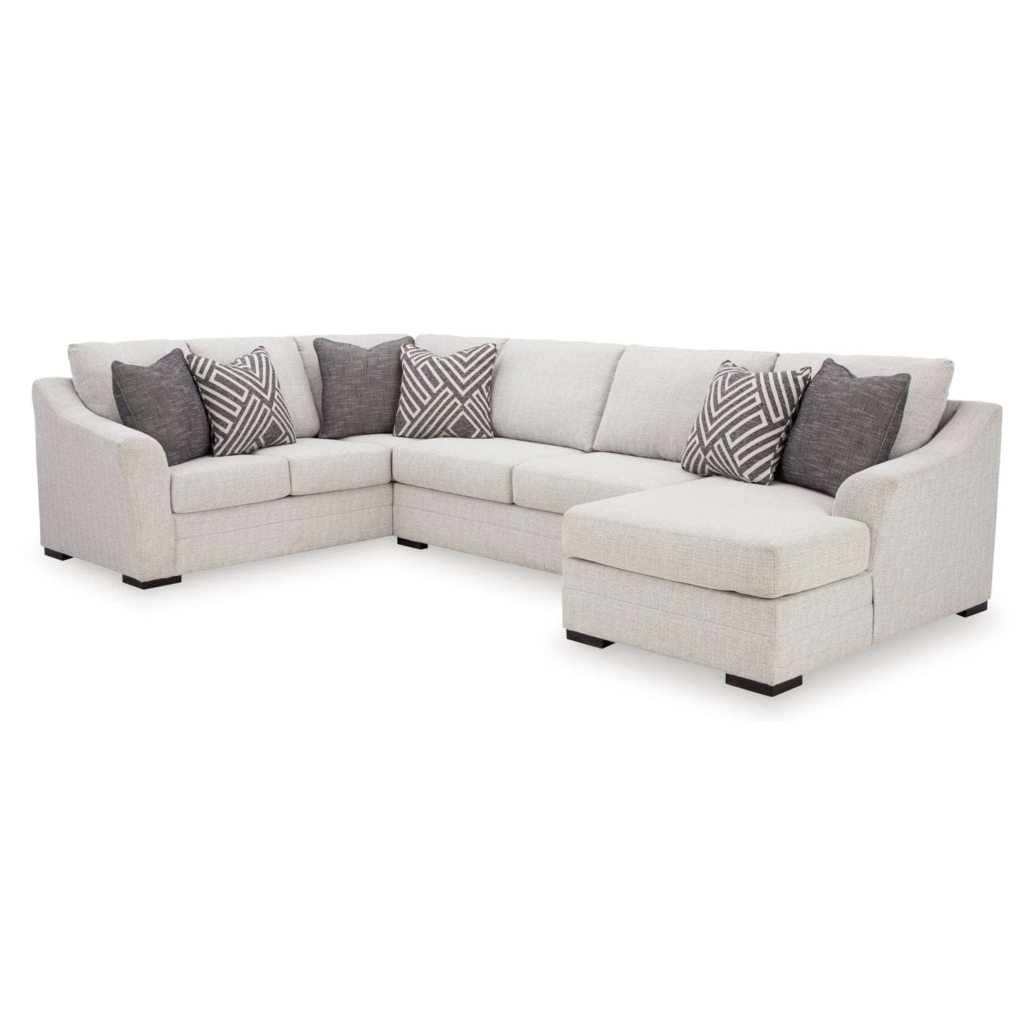 Olympian beige white RAF sectional chaise with grey patterned accent pillows displayed in white background