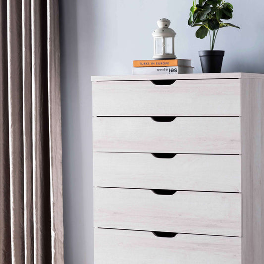 Abbe 5 drawer chest in white oak in bedroom setting