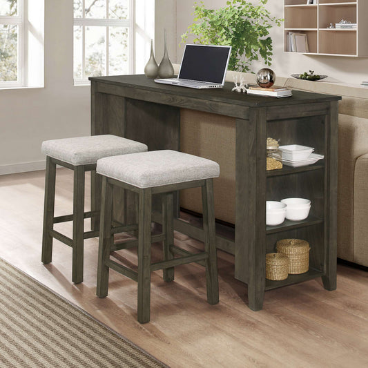 Andres grey counter height table with stools in a living room setting
