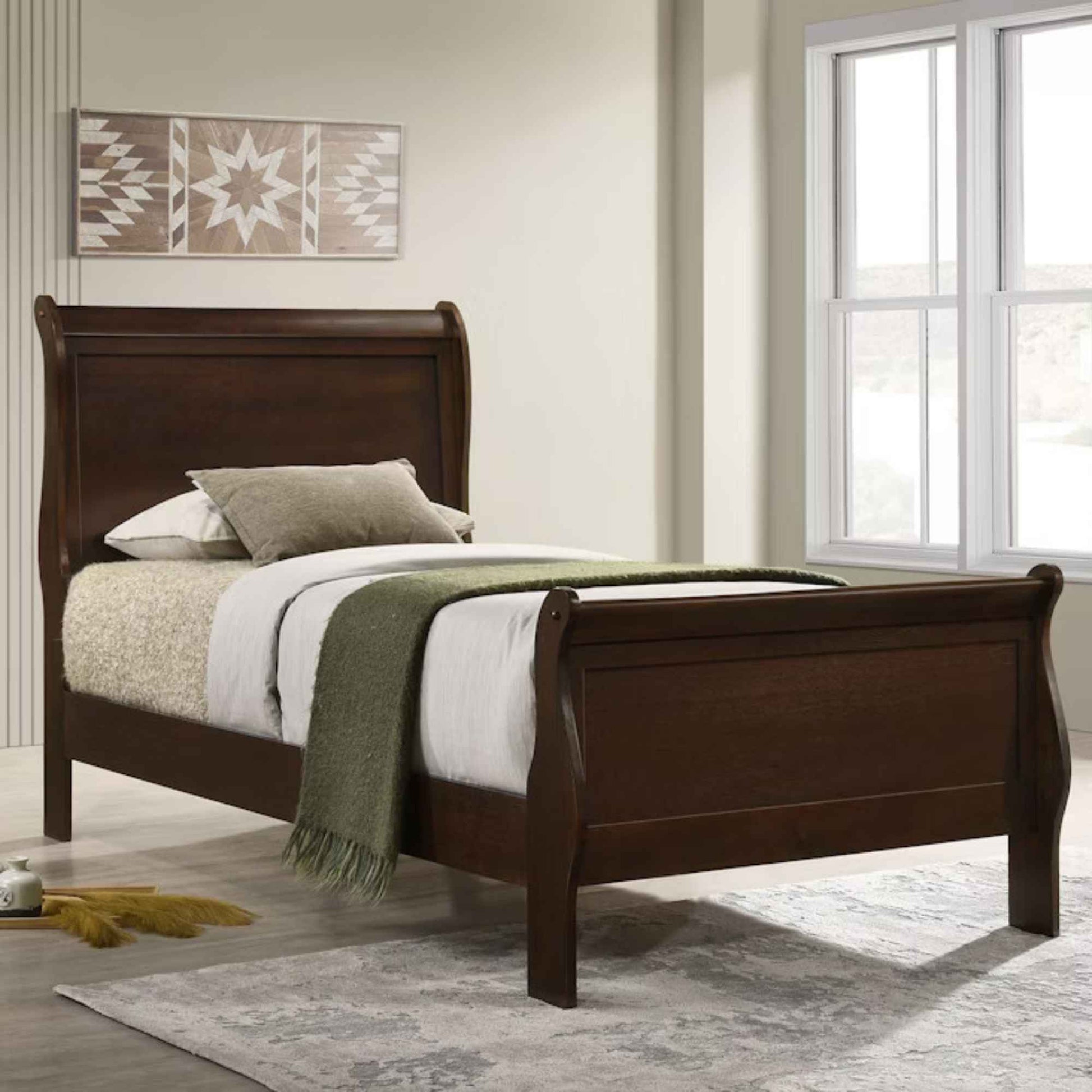 Wooden sleigh bed with bedding in a bedroom setting