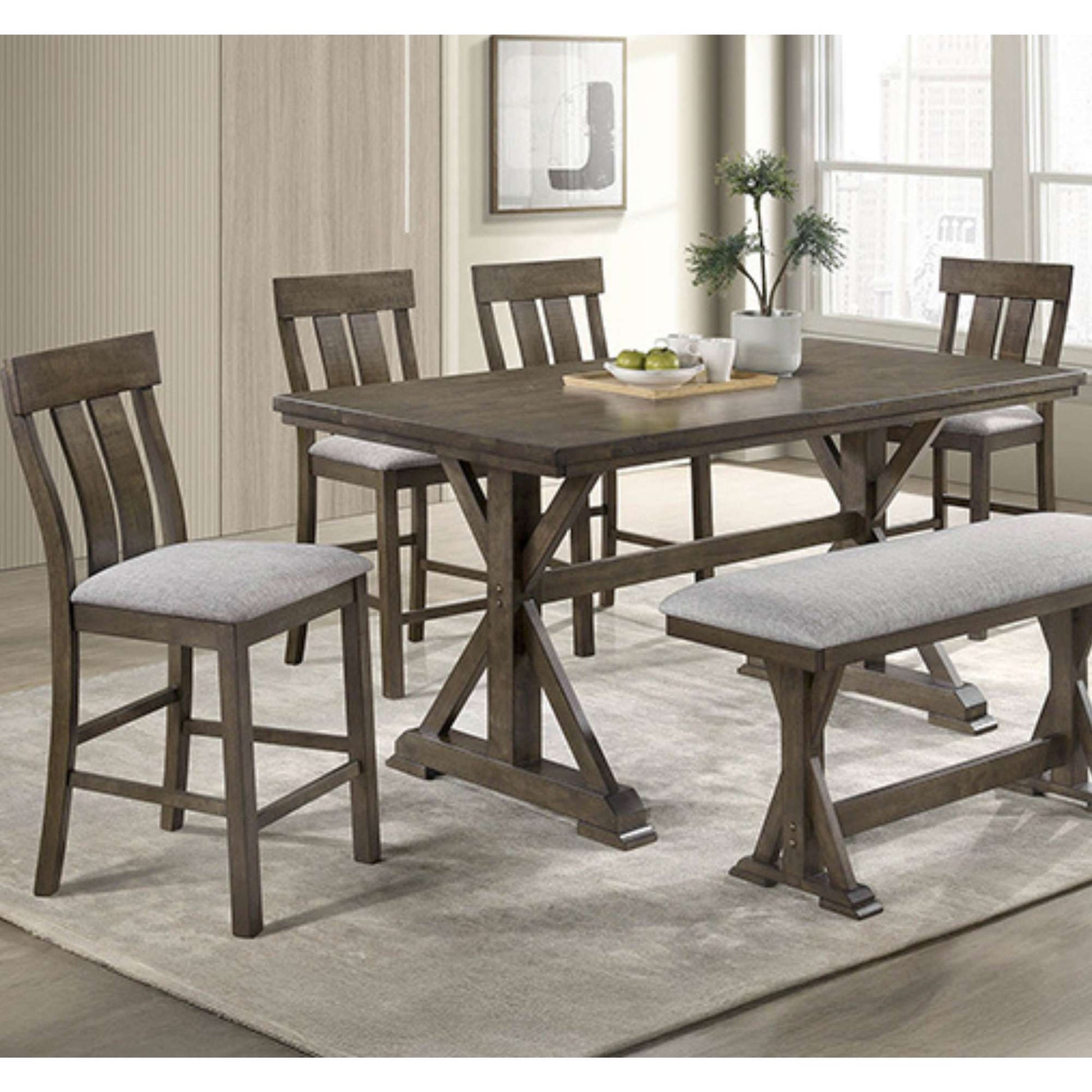 Braylee warm brown Dining room set with a counter height table, coutner height chairs and counter height bench in a home setting