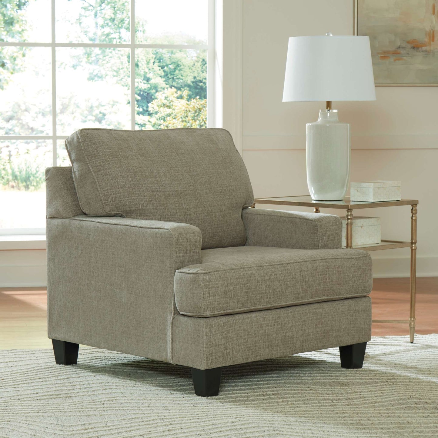 Cornet armchair in cork upholstery in living room setting