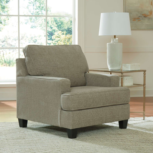 Cornet armchair in cork upholstery in living room setting