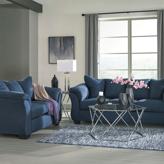 Blue Darcy Sofa and loveseat set with pillowtop arms in a living room setting with accents