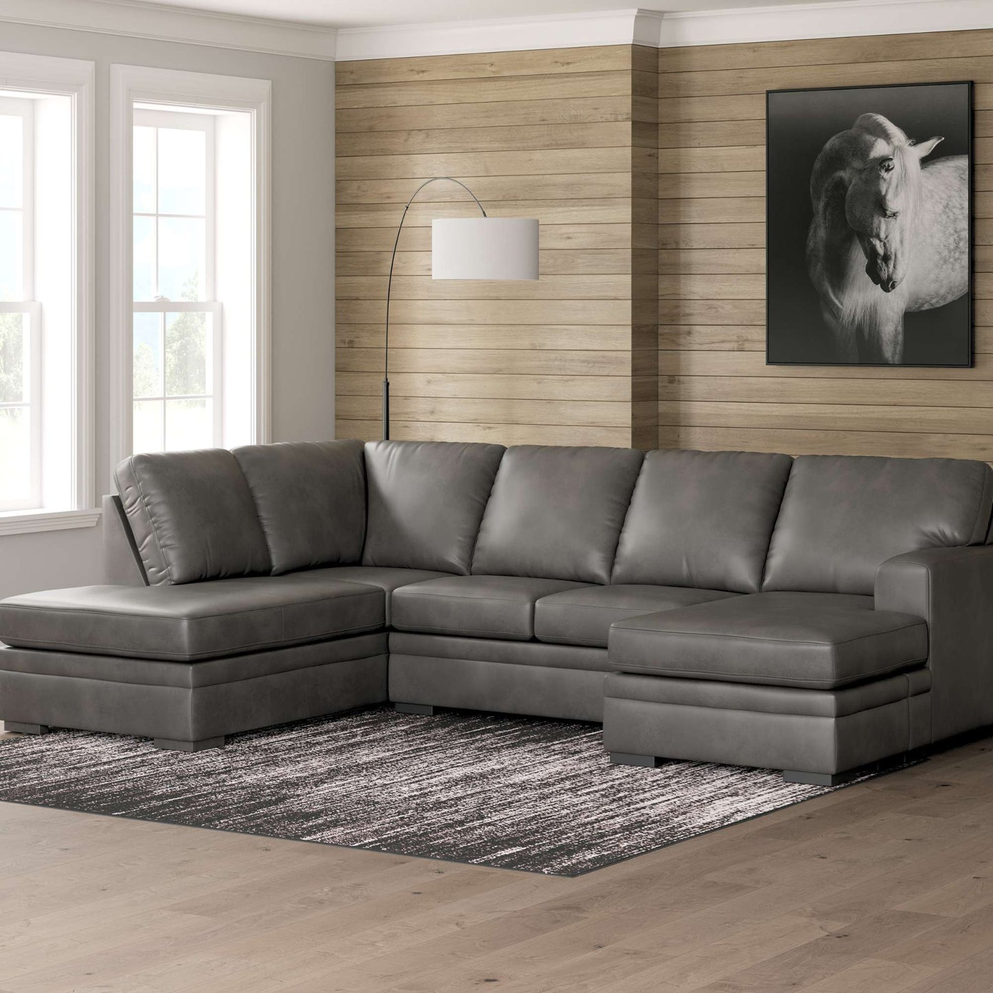 Devlin Shadow Gray sectional with Double Chaise in a living room with wooden walls and a horse painting.