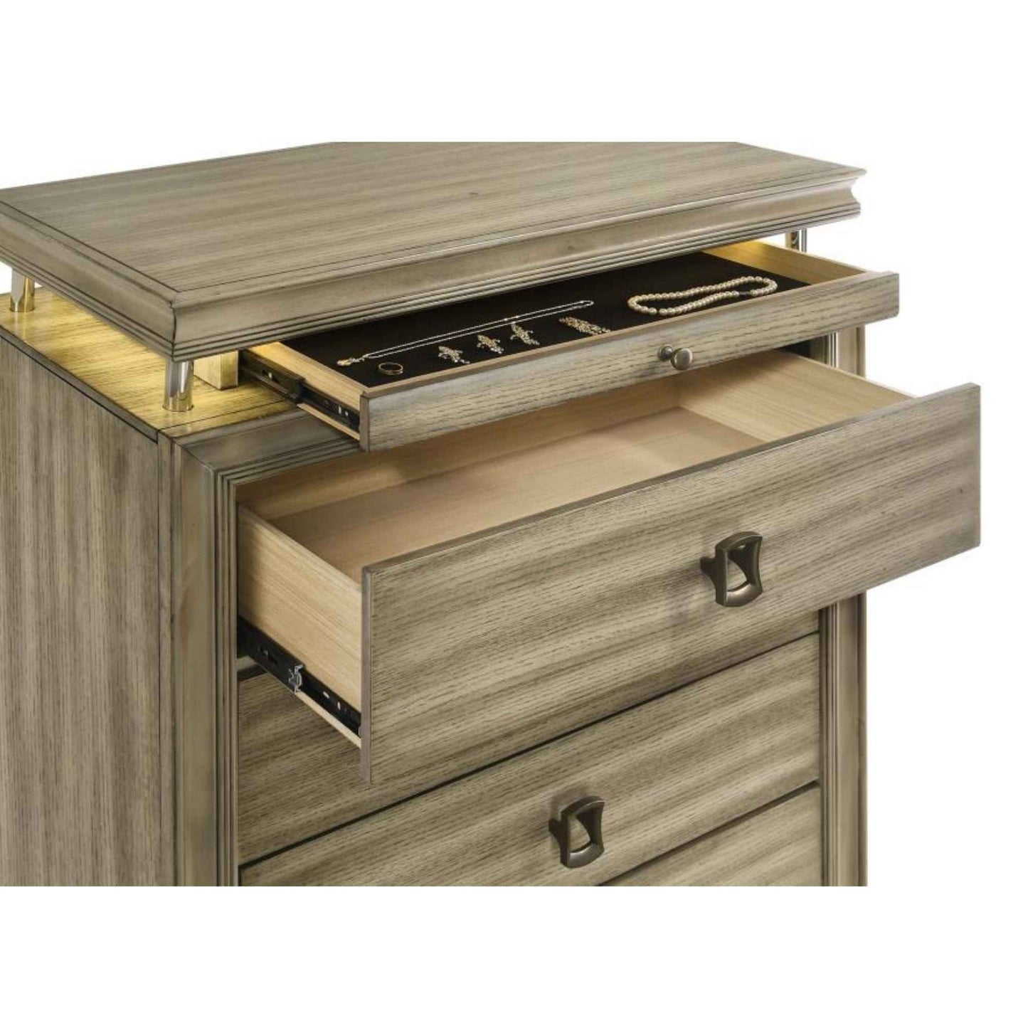 Wooden jewelry drawer with jewelry inside on a white background