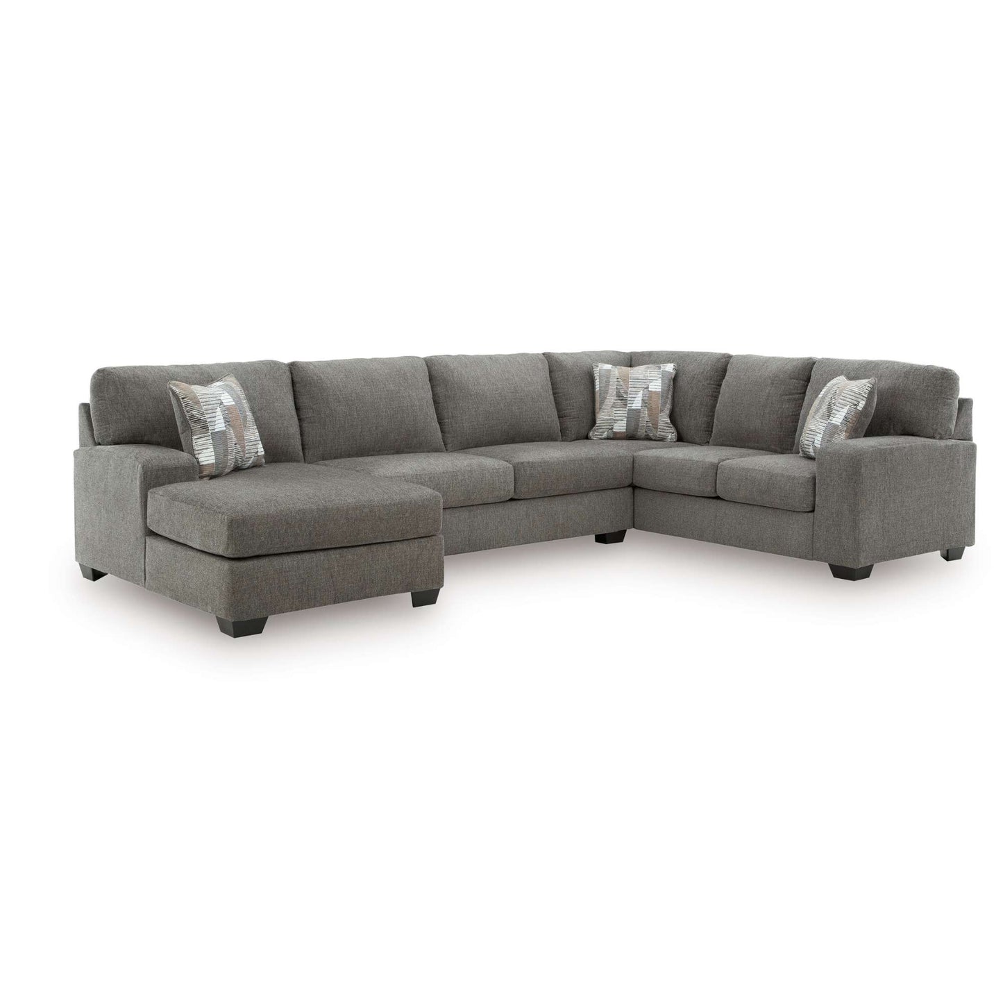 Kincaid 3 PC sectional includes a left-arm chaise, armless loveseat, and right-arm sofa with corner wedge. Displayed in white background