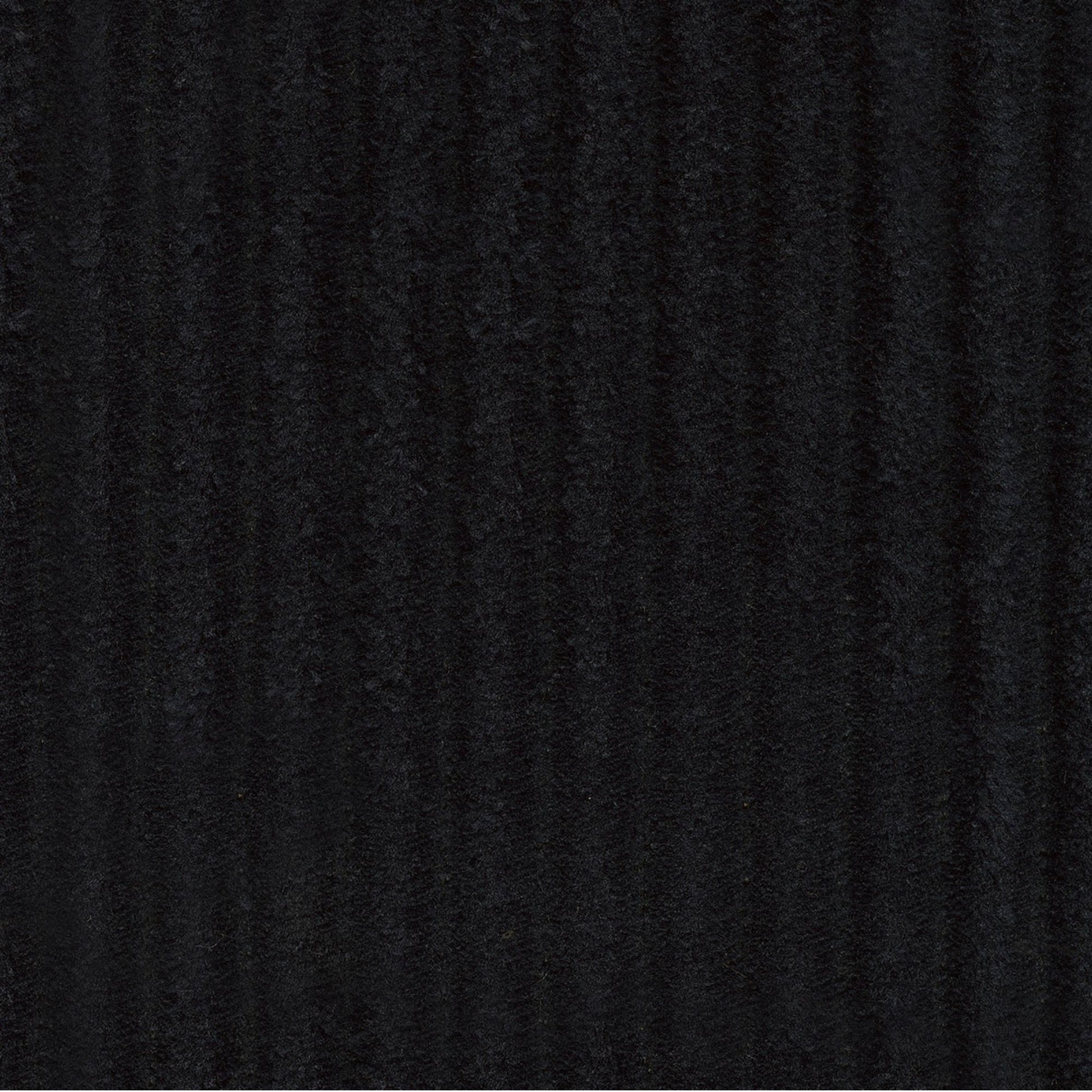 Swatch of onyx black corduroy fabric for orevis rocker recliner chair