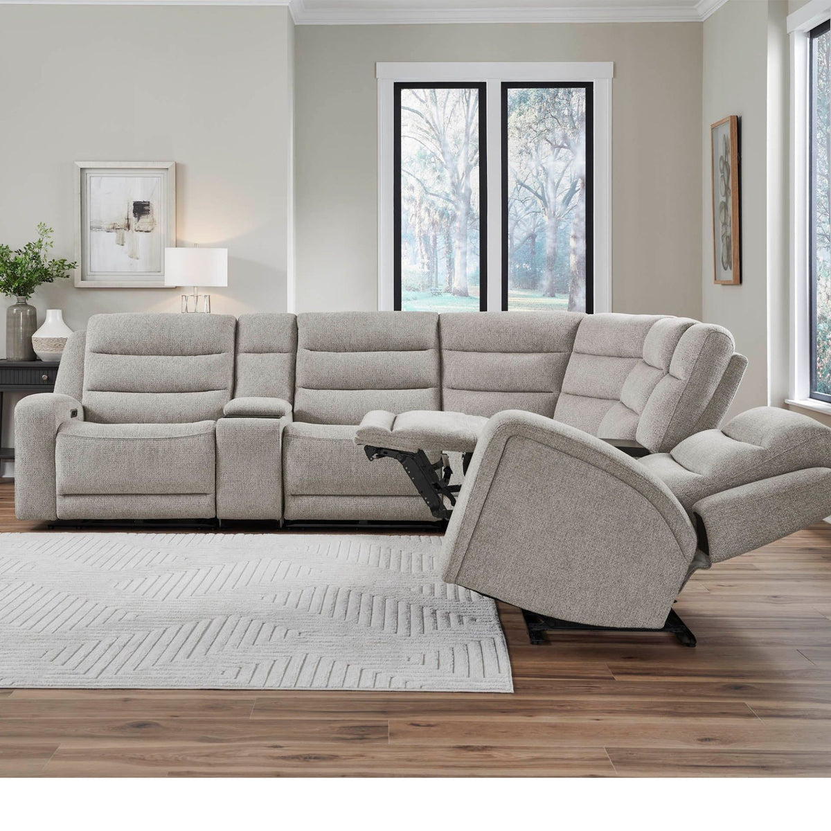 Terrian 6-Piece Power Motion Sectional with Power Adjustable Headrests in mari fawn upholstery in living room setting with decor. 
