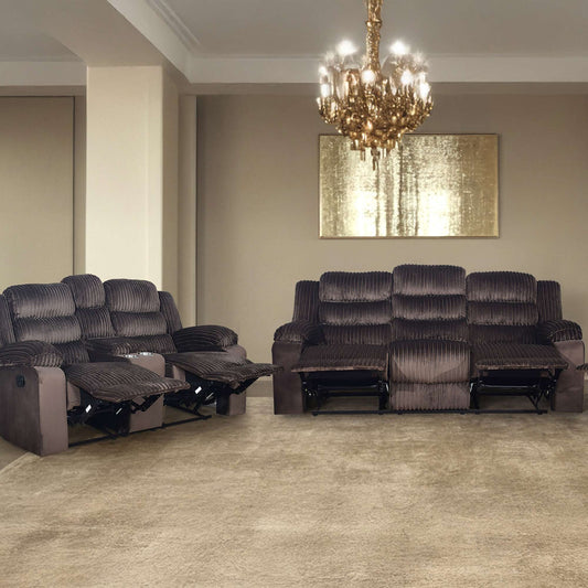 Living room with brown corduroy reclining sofas and a chandelier