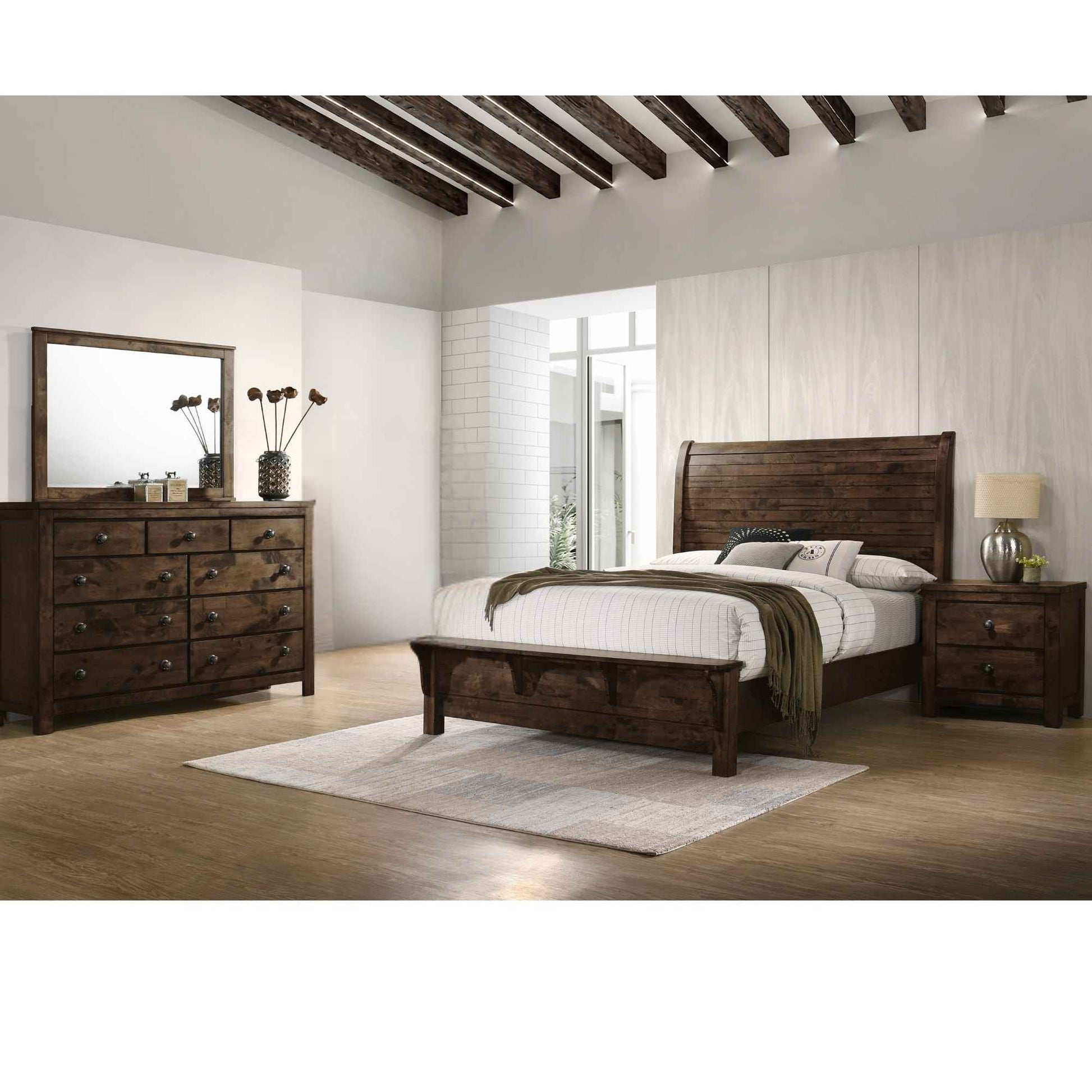 Wooden bedroom set with bed, dresser, and nightstands in a room with wooden beams.