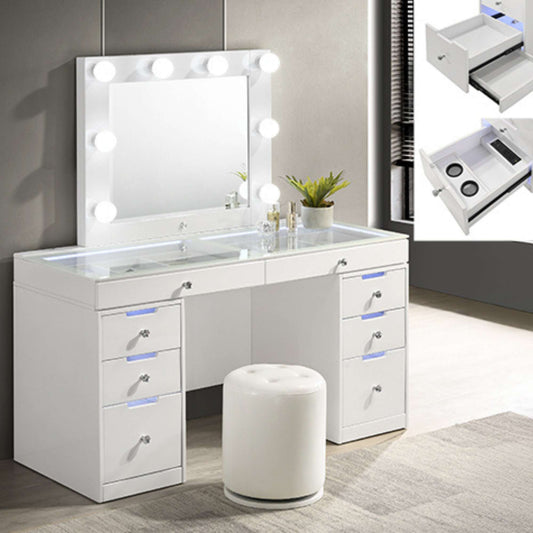 White vanity with illuminated mirror and drawers in a room setting.