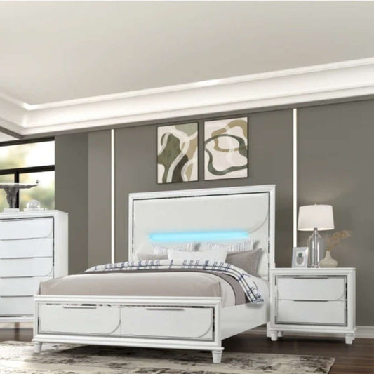 Modern bedroom set with a bed, nightstands, and dresser against a gray wall.