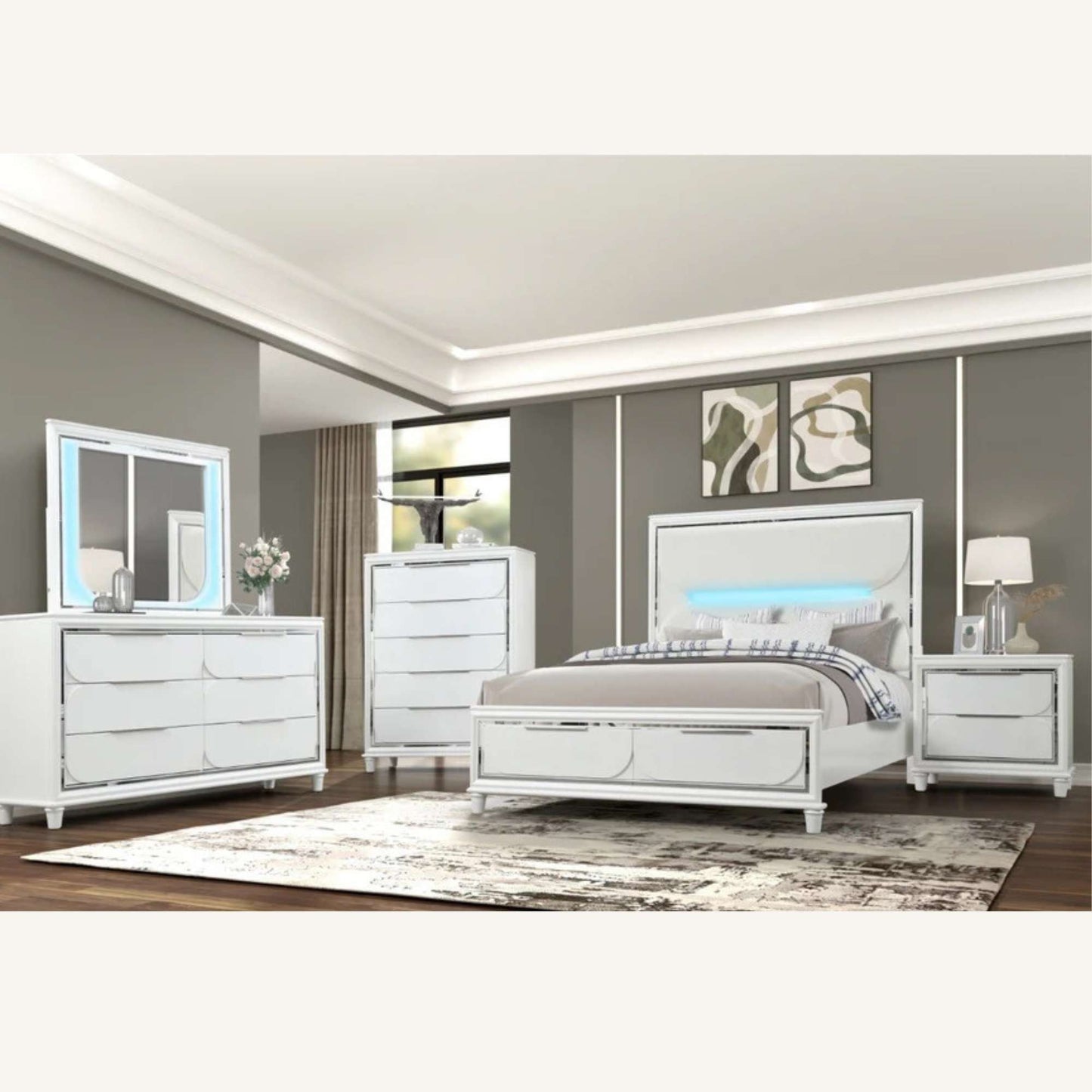 Modern bedroom set with white furniture in a room with gray walls and a rug.